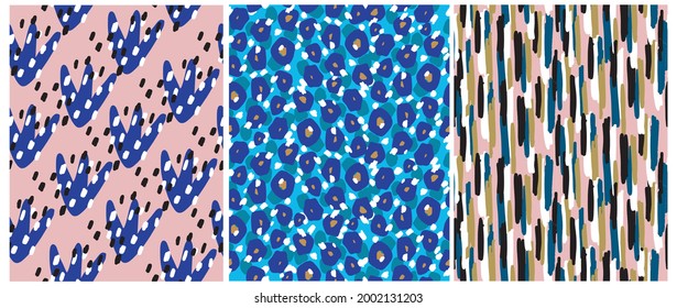 Abstract Leopard Skin Seamless Vector Patterns. White,Gold and Black Irregular Brush Spots and Lines on a Blue and Pink Backgrounds.Abstract Wild Animal Skin Print. Simple Irregular Geometric Design.
