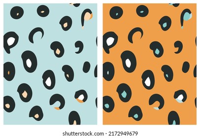 Abstract Leopard Skin Seamless Vector Patterns. Black and White Hand Drawn Irregular Spots Isolated on a Pastel Blue and Orange Backgroud.Wild Cat Skin Print ideal for Fabric, Textile, Wrapping Paper.