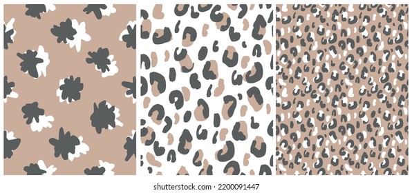 Abstract Leopard Skin Seamless Vector Patterns. Irregular Brush Spots on a Beige and White Backgrounds. Abstract Wild Animal Skin Print. Simple Irregular Geometric Design. Floral Repeatable Print.