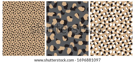 Abstract Leopard Skin Seamless Vector Patterns. White, Brown and Black Irregular Brush Spots on a Gray and Gold Backgrounds.  Abstract Wild Animal Skin Print. Simple Irregular Geometric Design.