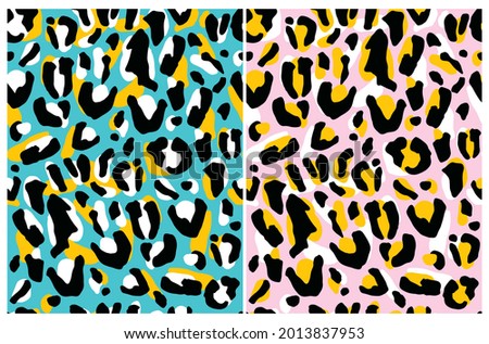 Abstract Leopard Skin Seamless Vector Patterns. White, Yellow and Black Irregular Brush Spots on a Pink and Blue Backgrounds. Abstract Wild Animal Skin Design. Simple Wild Cat Fur Print.