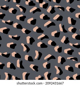Abstract leopard skin vector seamles pattern.  irregular brush spots and  backgrounds. Abstract wild animal skin print. Simple irregular geometric design.