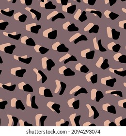 Abstract leopard skin vector seamles pattern.  irregular brush spots and  backgrounds. Abstract wild animal skin print. Simple irregular geometric design.