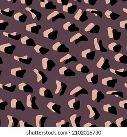 Abstract leopard skin vector seamles pattern.  irregular brush spots and  backgrounds. Abstract wild animal skin print. Simple irregular geometric design.