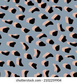 Abstract leopard skin vector seamles pattern.  irregular brush spots and  backgrounds. Abstract wild animal skin print. Simple irregular geometric design.