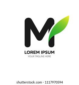 Abstract letter M logo vector design. Icon eco character and leaf concept template.