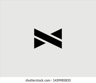 Abstract letter M, N vector icon logo. Minimalistic butterfly tie logotype