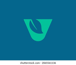 Abstract letter V logo isolated on dark background. Minimalistic leaf, forest, garden vector sign symbol mark logotype
