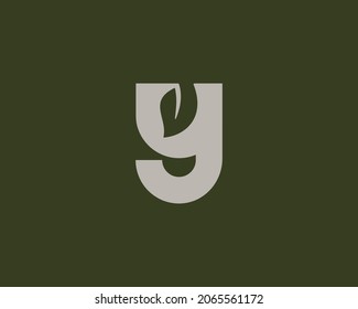 Abstract letter Y logo isolated on dark background. Minimalistic leaf, forest, garden vector sign symbol mark logotype
