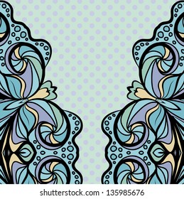 Abstract light blue pattern with ornamental left and right borders against the polka dot background.