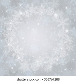 Abstract light christmas background with snowflakes.