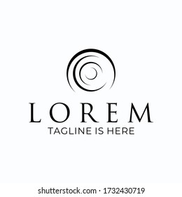 Abstract logo design with a circular shape.