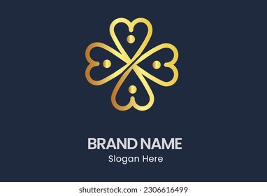 abstract logo featuring a green clover with four leaves in the shape of a heart. The logo represents the Irish symbol of luck known as the shamrock and signifies ecological businesses and companies as