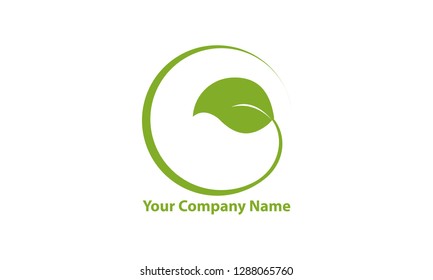 abstract logo with green leaf