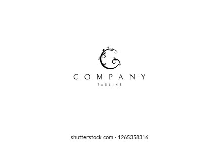 Abstract logo of the letter G in the form of a tree branch with leaves.