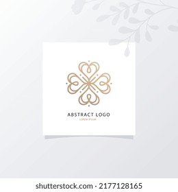 Abstract logo at square paper mockup with realistic shadows overlays leaf