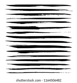 Abstract long black textured smears set  isolated on a white background