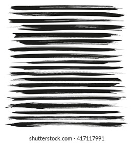 Abstract long black vector brush strokes isolated on a white background