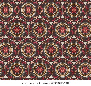 Abstract mandala flower pattern. Circle colorful flower pattern on brown background.