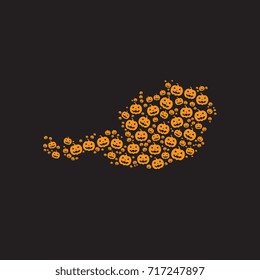 abstract map of austria filled with orange halloween pumpkins heads on a black background