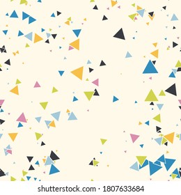 Abstract Memphis seamless pattern with colorful chaotic small triangles. Infinity triangular messy geometric pattern. Colorful Terrazzo tile. Vector illustration. 