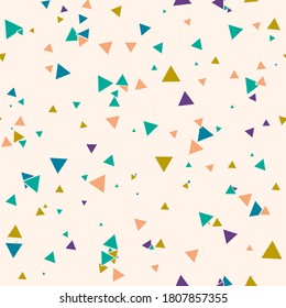 Abstract Memphis seamless pattern with colorful chaotic small triangles. Infinity triangular messy geometric pattern. Colorful Terrazzo tile. Vector illustration.