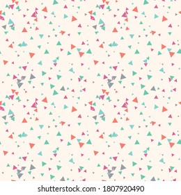 Abstract Memphis seamless pattern with colorful chaotic small triangles. Infinity triangular messy geometric pattern. Colorful Terrazzo tile. Vector illustration.