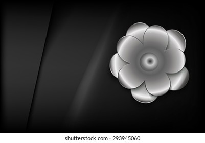 The abstract metallic flower on the dark background