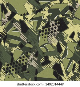 Abstract military pattern with grunge elements, paint splashes, dots. Seamless green background For sportswear, textiles. Grunge background for boys
