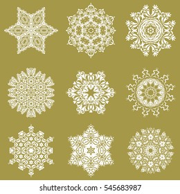 Abstract minimal set of nine vector snowflakes on a yellow background.
