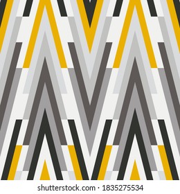 Abstract modern chevron pattern in yellow and gray colors. Vector seamless pattern design for textile, fashion, paper, packaging and branding. 