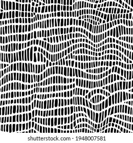 Abstract modern crocodile leather seamless pattern. Animals trendy background. Black and white decorative vector illustration for print, fabric, textile. Modern ornament of stylized alligator skin.