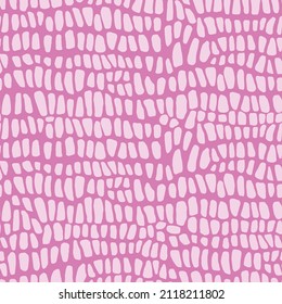 Abstract modern crocodile leather seamless pattern. Animals trendy background. Pink decorative vector illustration for print, fabric, textile. Modern ornament of stylized alligator skin.