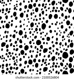 Abstract modern dalmatian fur seamless pattern. Animals trendy background. Black and white decorative vector illustration for print, card, postcard, fabric, textile. Modern ornament of stylized skin.