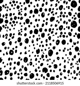 Abstract modern dalmatian fur seamless pattern. Animals trendy background. Black and white decorative vector illustration for print, card, postcard, fabric, textile. Modern ornament of stylized skin.