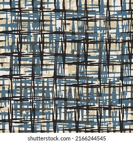 Abstract modern grunge texture pattern. Seamless black, green, blue and yellow tartan plaid background.