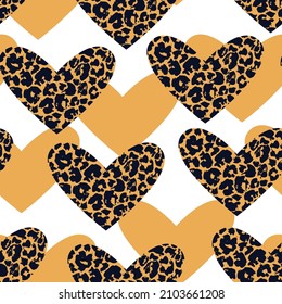 Abstract modern heart shape silhouette with skin print seamless pattern. Hand drawn leo fur hearts background. Vector art illustration for Saint Valentine's day, love concept wallpaper