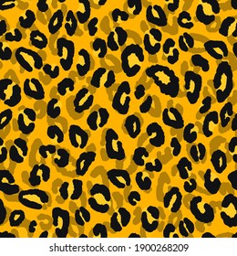 Abstract modern leopard seamless pattern. Animals trendy background. Yellow and black decorative vector stock illustration for print, card, postcard, fabric, textile. Modern ornament of stylized skin.