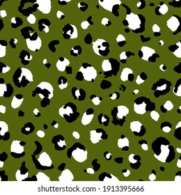 Abstract modern leopard seamless pattern. Animals trendy background. Green and black decorative vector stock illustration for print, card, postcard, fabric, textile. Modern ornament of stylized skin.