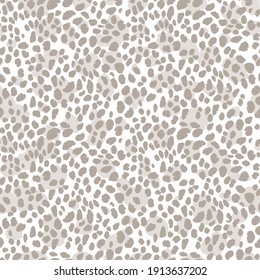 Abstract modern leopard seamless pattern. Animals trendy background. Beige decorative vector stock illustration for print, card, postcard, fabric, textile. Modern ornament of stylized skin.