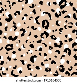 Abstract modern leopard seamless pattern. Animals trendy background. Beige and black decorative vector stock illustration for print, card, postcard, fabric, textile. Modern ornament of stylized skin.