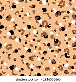 Abstract modern leopard seamless pattern. Animals trendy background. Beige and black decorative vector stock illustration for print, card, postcard, fabric, textile. Modern ornament of stylized skin.