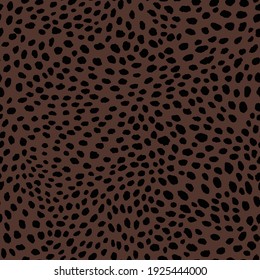 Abstract modern leopard seamless pattern. Animals trendy background. Beige and black decorative vector stock illustration for print, card, postcard, fabric, textile. Modern ornament of stylized skin.