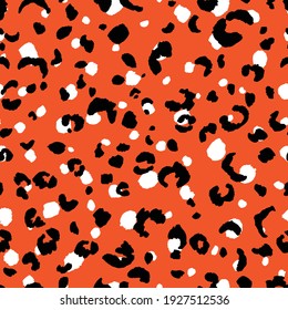 Abstract modern leopard seamless pattern. Animals trendy background. Orange and black decorative vector stock illustration for print, card, postcard, fabric, textile. Modern ornament of stylized skin.