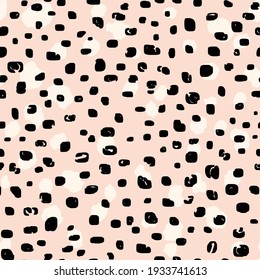 Abstract modern leopard seamless pattern. Animals trendy background. Beige and black decorative vector stock illustration for print, card, postcard, fabric, textile. Modern ornament of stylized skin.