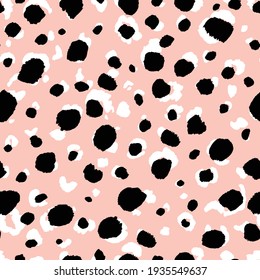 Abstract modern leopard seamless pattern. Animals trendy background. Beige and black decorative vector stock illustration for print, card, postcard, fabric, textile. Modern ornament of stylized skin.