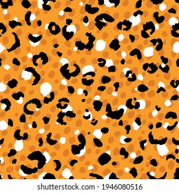 Abstract modern leopard seamless pattern. Animals trendy background. Orange and black decorative vector stock illustration for print, card, postcard, fabric, textile. Modern ornament of stylized skin.