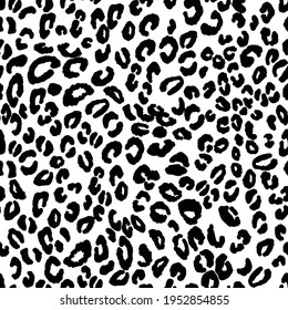 Abstract modern leopard seamless pattern. Animals trendy background. Black and white decorative vector illustration for print, card, postcard, fabric, textile. Modern ornament of stylized skin.