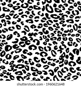 Abstract modern leopard seamless pattern. Animals trendy background. Black and white decorative vector illustration for print, card, postcard, fabric, textile. Modern ornament of stylized skin.
