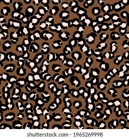 Abstract modern leopard seamless pattern. Animals trendy background. Beige and black decorative vector stock illustration for print, card, postcard, fabric, textile. Modern ornament of stylized skin.